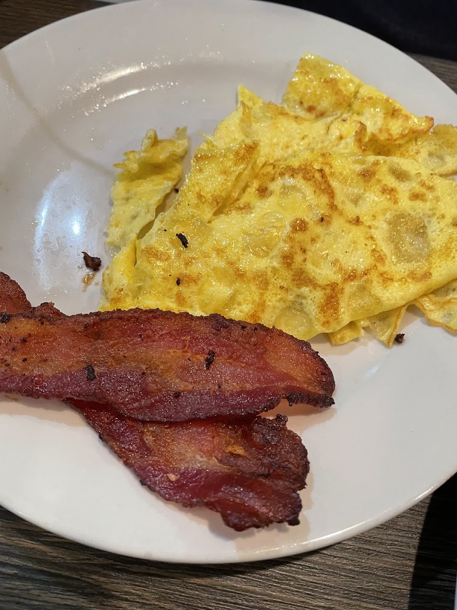 Scrambled eggs and bacon. Bacon was very salty but meal seemed safe.