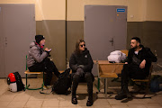 Kyivans wait for an air raid to end in a bomb shelter inside the school on February 26, 2022 in Kyiv, Ukraine. Kobus Olivier, the chief executive of the Ukraine Cricket Federation (UCF) locked himself in his seventh-floor apartment in the capital.

