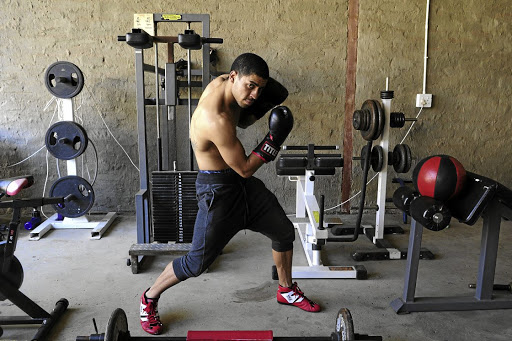 Joshua Studdard training at his home gym in Sophiatown.