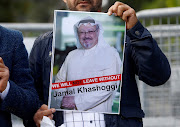 A demonstrator holds a picture of Saudi journalist Jamal Khashoggi during a protest outside the Saudi Arabian consulate in Istanbul, Turkey, last week.