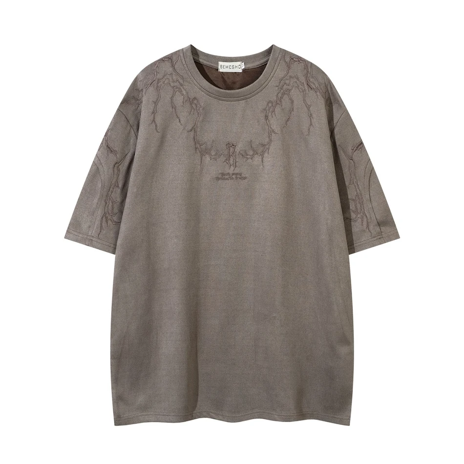 T-shirt estivo in camoscio con ricamo spine, maniche corte. Goditi comfort e stile con questo capo morbido e traspirante, perfetto per l'estate.