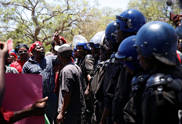 Anti-riot police block public sector workers from marching to government offices with a petition demanding better pay in Harare, Zimbabwe on November 6 2019. REUTERS/ PHILIMON BULAWAYO