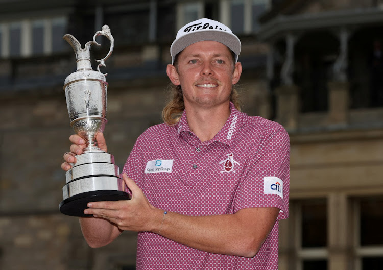 Australia's Cameron Smith poses with the Claret Jug as he celebrates after winning The Open Championship at the Old Course, St Andrews, Scotland on July 17, 2022