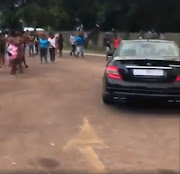 A child arrived at school in a Merceds Benz.