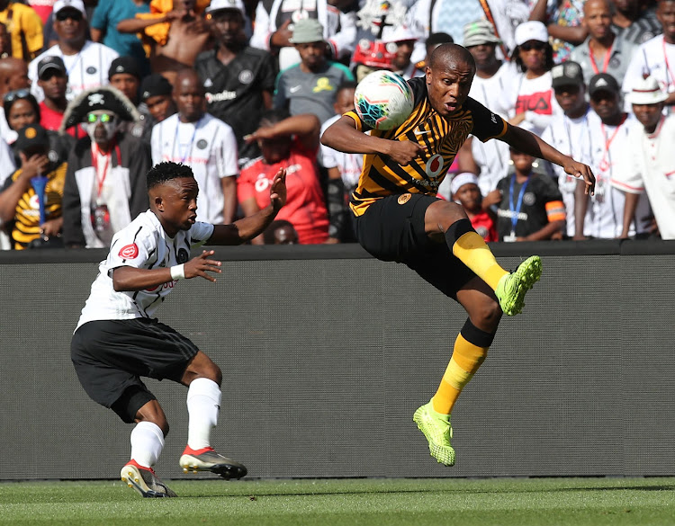 Lebogang Manyama of Kaizer Chiefs challenged by Paseka Mako of Orlando Pirates during the Absa Premiership 2019/20 match between Kaizer Chiefs and Orlando Pirates at FSoccer City, Polokwane, on 09 November 2019.