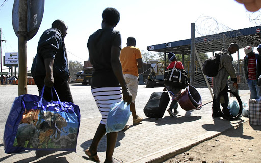 SA-based Zimbabwean citizens crossed the Beitbridge border post in Musina at the weekend. Their country goes to the polls today.