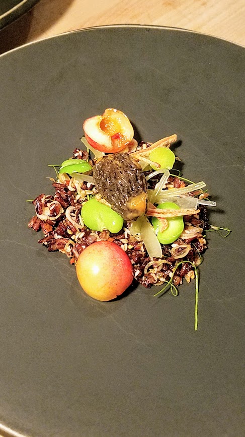 Langbaan Chefs Who Inspire Dinner with Edouardo Jordan of Salare and Junebaby, a collaboration with Chef Earl Ninsom of Langbaan to benefit Farestart. Southern Thai rice berry salad with morel mushrooms, cherry, peaches, celtuce, fava beans, and shortly, frozen duck liver