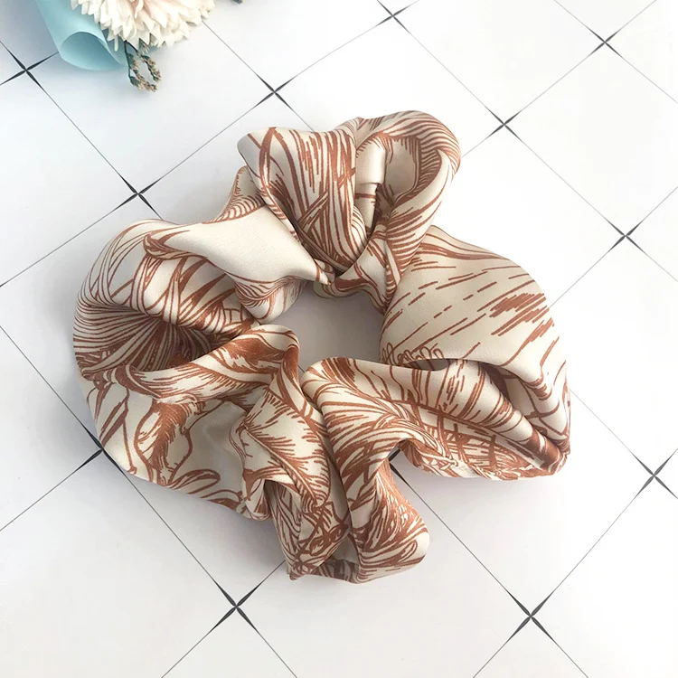INS Wind dames haarband met bamboe bladprint, stoffen haaraccessoire, ideaal om het haar op zijn plaats te houden met stijl en comfort.