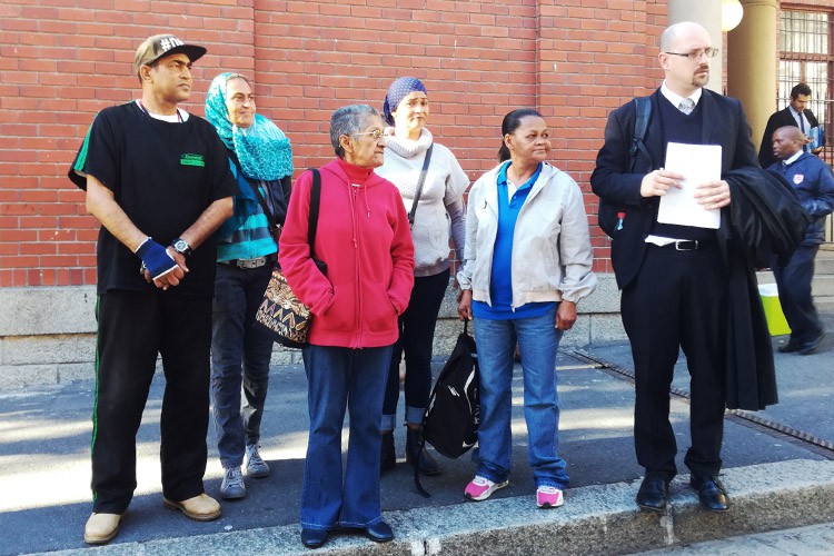Albert Road residents with their lawyer Mark Owen outside the Cape Town Magistrates’ court last month.