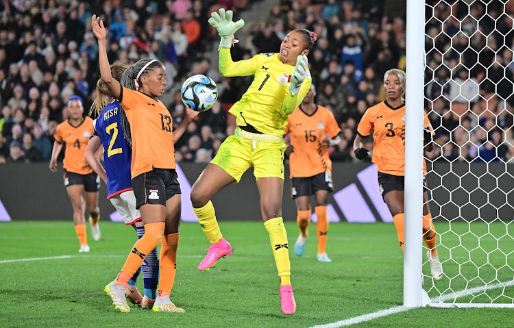 Zambia goalkeeper Catherine Musonda (in yellow) makes a save during group C match against Japan at the Fifa Women's World Cup in Hamilton, New Zealand on July 22