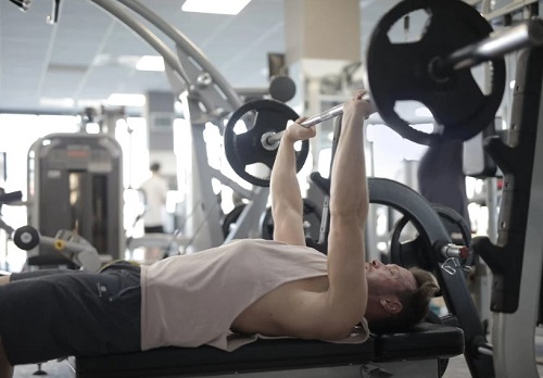 Man Doing Chest Tricep Workout