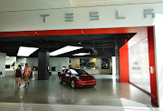 Tesla vehicles are on display at a showroom in the Aventura Mall on March 19, 2021 in Miami, Florida. 