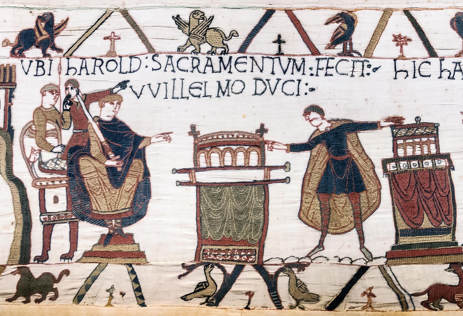 Image from the Bayeux Tapestry depicting the Norman conquest of England in which one ruler pledges fealty to another. 