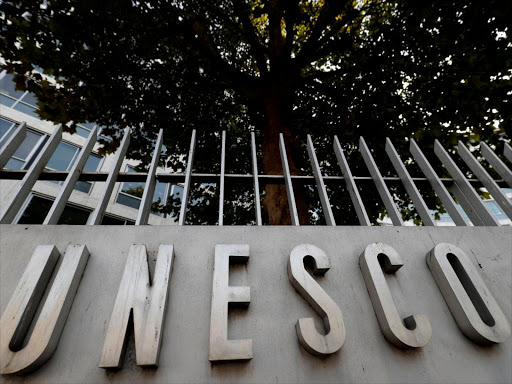 The logo of the United Nations Educational, Scientific and Cultural Organization (UNESCO) is seen in front of its headquarters in Paris, France, October 4, 2017. /REUTERS