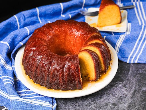 Sliced Rum Glazed Pound Cake on a plate.