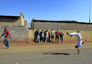 Zama Mofokeng performs one-hand backflips in Tembisa on the East Rand. 