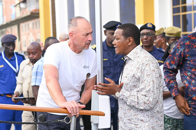 Tourism CS Alfred Mutua interacts with tourists after the cruise ship docked in Mombasa on February 2, 2024