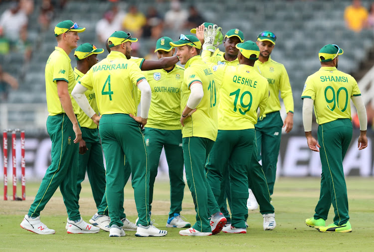 Andile Phehlukwayo of South Africa celebrates with teammates after taking a wicket of Niroshan Dickwella of Sri Lanka during the Interbational T20 Series match at Wanderers Stadium in Johannesburg on March 24 2019.