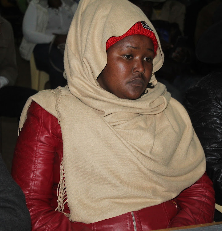 Eunice Wagaki, Karima MCA-elect, waits for results announcement at Othaya Boys High School in Othaya on Thursday night