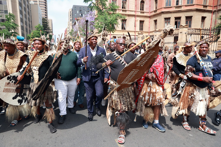 Group of Amabutho, gathered outside Pretoria High Court pledging support to King Misuzulu Zulu.