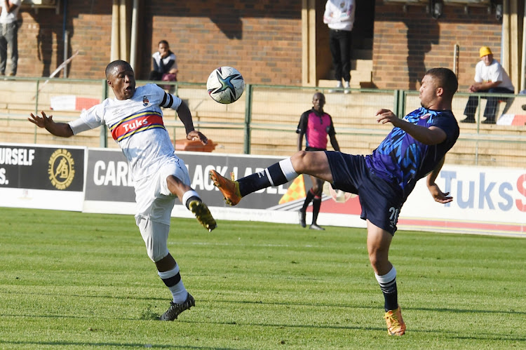 Samuel Julies of University of Pretoria and Junaid Said of Swallows FC during the PSL Promotion Playoff match between University of Pretoria and Swallows FC at ABSA Tuks Stadium on June 04, 2022 in Pretoria.