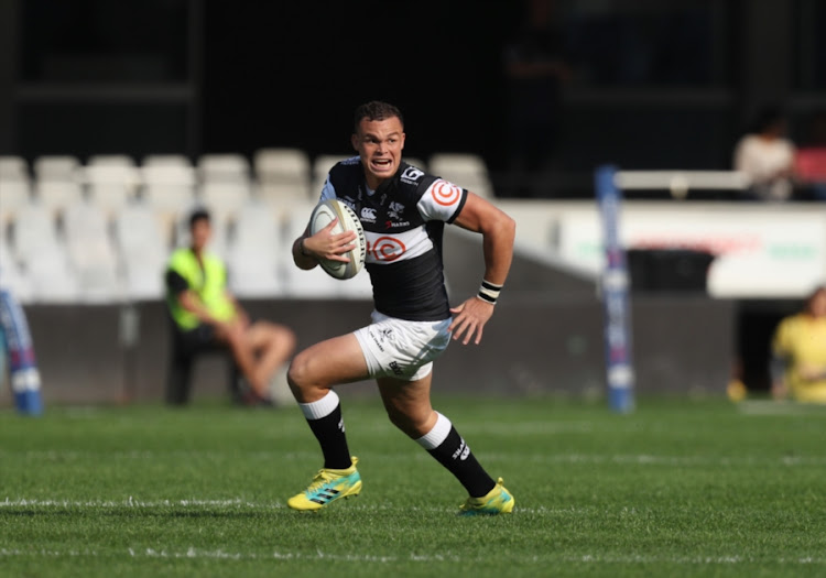 Curwin Bosch of the Cell C Sharks runs away from his markers during the Currie Cup match against Vodacom Blue Bulls at Jonsson Kings Park Stadium on August 25, 2018 in Durban, South Africa.