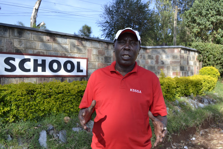 KSSSA secretary general, David Ngugi at the Kapsaabet Boys High School grounds during the inspection