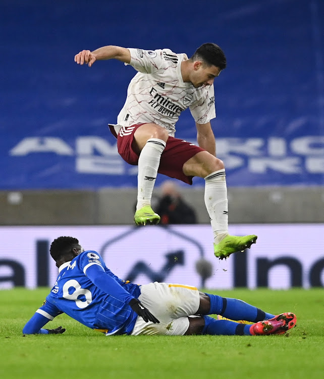 Arsenal's Gabriel Martinelli in action with Brighton's Yves Bissouma in recent match