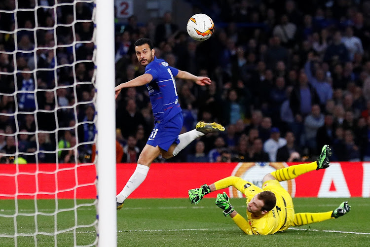 Chelsea's Pedro scores past Slavia Praha goalkeeper Ondrej Kolar