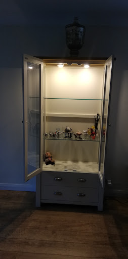 Wired and fitted spot lights in display cabinet