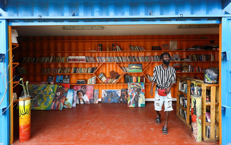 Francisco Mapanda, one of the founding members of a makeshift library, walks out of the 'library' under the bridge, at the Luanda suburbs in Angola August 22 2022. Picture: REUTERS/SIPHIWE SIBEKO