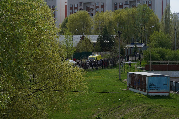 Students are evacuated during a deadly shooting at School Number 175 in Kazan, Tatarstan, Russia May 11, 2021 in this image obtained from social media. Courtesy of Max Zareckiy via REUTERS