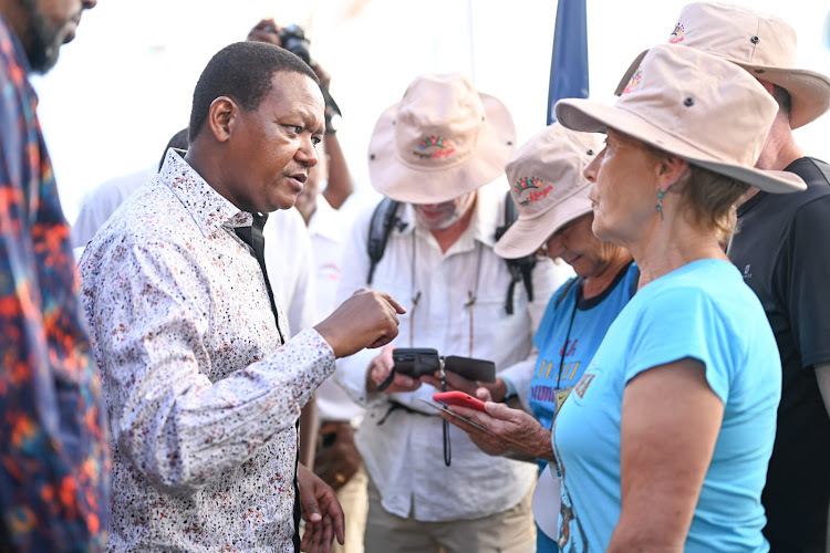 Tourism CS Alfred Mutua interacts with tourists after the cruise ship docked in Mombasa on February 2, 2024