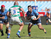 Mornay Smith of the Bulls challenged by Simone Ferrari of Benetton Rugby during their United Rugby Championship match at Loftus Versfeld Stadium.