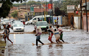 Heavy rain floods Ellias Motsoaledi road in Dobsonville,Soweto 