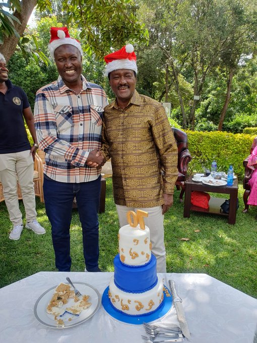 Wiper Leader Kalonzo Musyoka and Kathiani MP Robert Mbui before cutting the cake to celebrate his 70 birth day