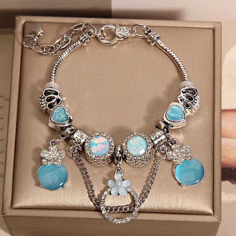 Vrouwen Mori Style roze kattenoog schattige bloemen hanger armband. Een charmante armband die je outfit compleet maakt, perfect voor elke dag.