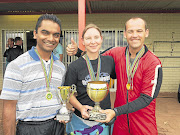 FULL FORCE: The Air Force 1 team: Lieutenant Shyam Kommal and Major Corné Myburgh, flank civilian skydiver Marie Nel at the SA National Defence Force Parachuting Championship