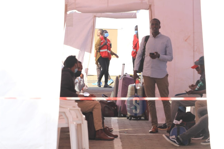 A section of the 63 Kenyans who were evacuated from Sudan at JKIA on April 27, 2023.