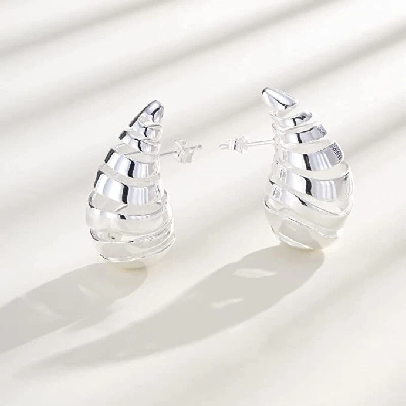 Boucles d'oreilles pendantes creuses en spirale plaqué or Design de personnalité original européen et américain Bijoux métal femme