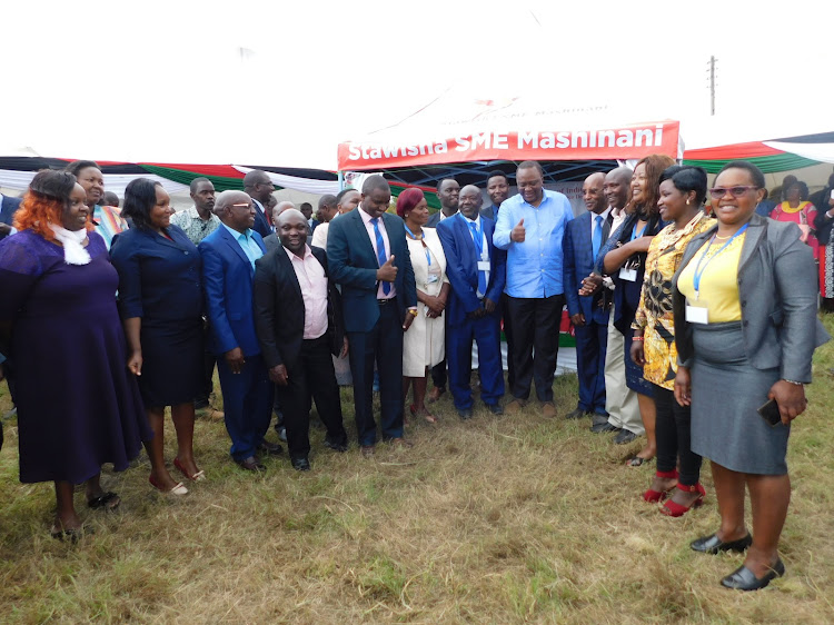 President Uhuru Kenyatta, Nyandarua Governor Francis Kimemia and MCAs on the county commissioner's grounds on January 31, 2020.