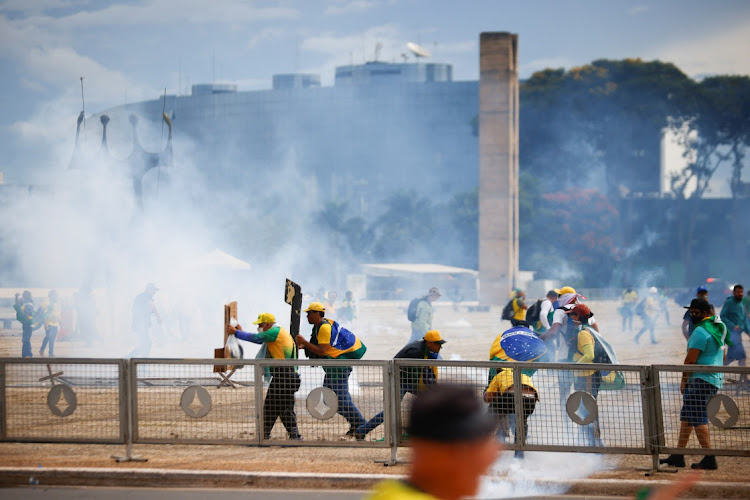 Supporters of Brazil's former president Jair Bolsonaro demonstrate against President Luiz Inacio Lula da Silva outside Congress in Brasilia, Brazil, January 8 2023. Picture: ADRIANO MACHADO/REUTERS