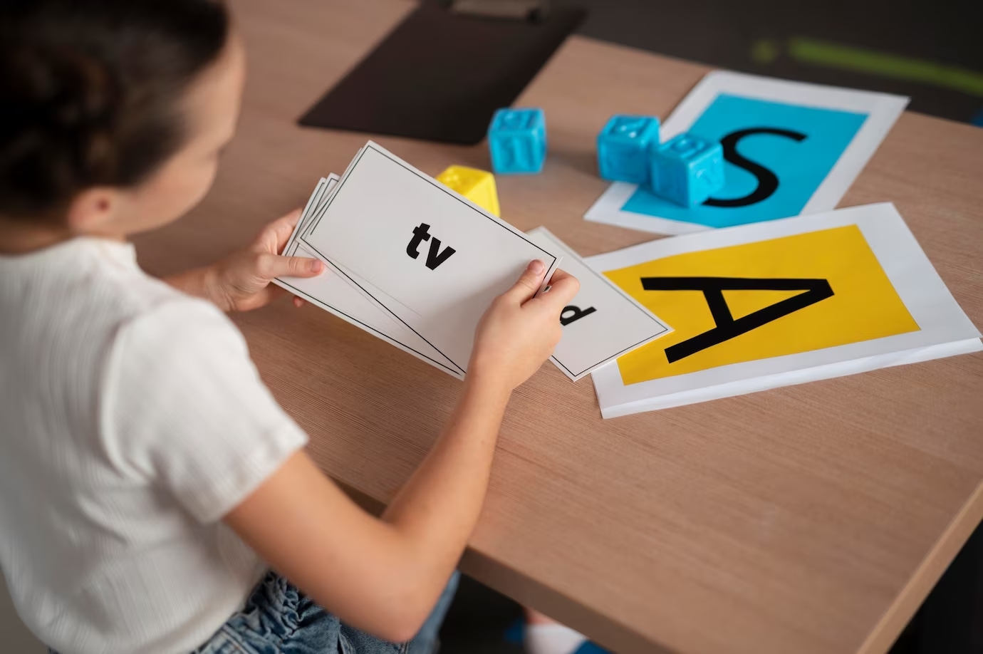 A little kid learning phonics