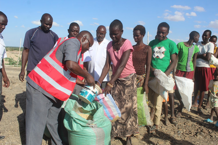 The Salvation Army Kenya West Territory distributes maize, beans, rice, cooking oil, hand soap and water to the than 400 families in drought-stricken in Turkana North.