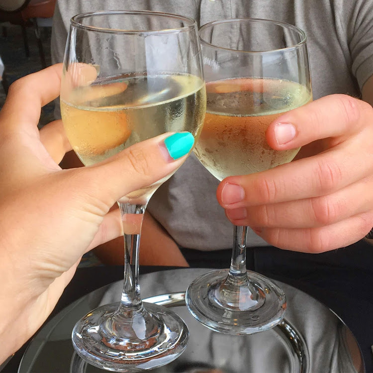 Cheers! Guests do a champagne toast during a brunch cruise on Hornblower Cruises.