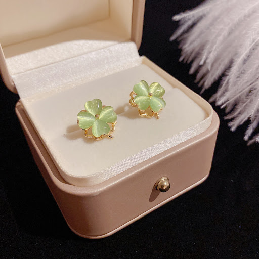 Title 2, Rotatable Set Ear Studs Four-leaf Clover. Enjoy...