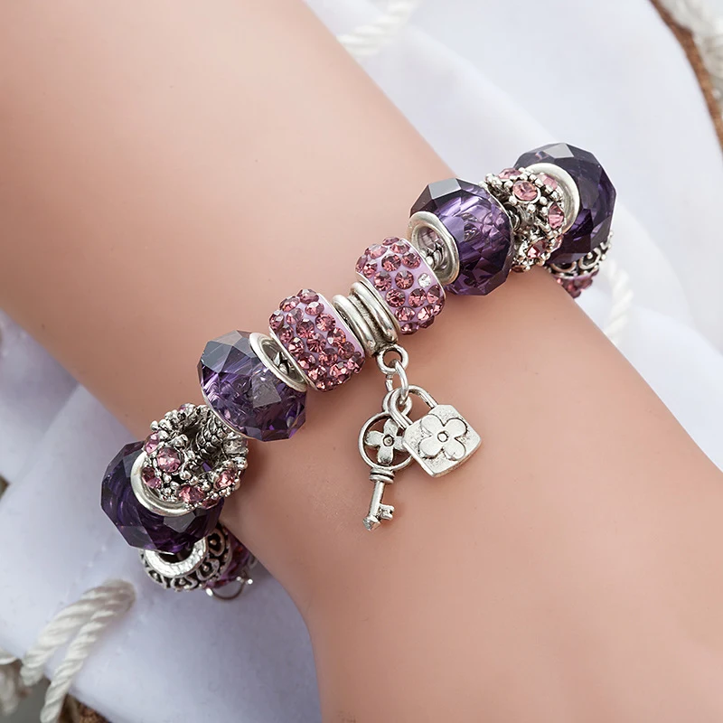 Mode sleutelhanger met grote gat glazen kralen hanger en kralen armband. Stijlvolle set, perfect cadeau voor elke gelegenheid.