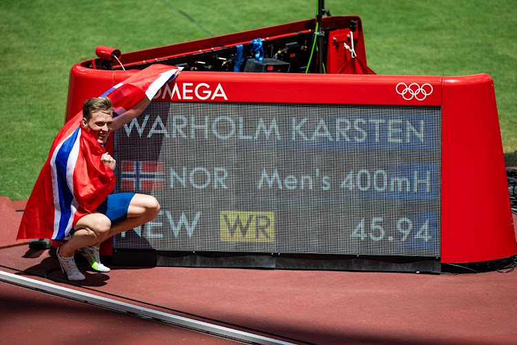 Norway's Karsten Warholm won the men's 400m hurdles in a world record 45.94 seconds at the Tokyo Olympics.