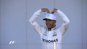 Mercedes driver Lewis Hamilton celebrates after winning the Japanese Grand Prix at Suzuka on Sunday 8 October 2017. 