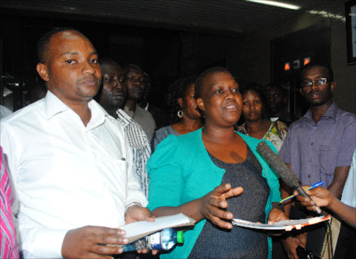 PLEASE PAY US: The chairperson of the suppliers, Diana Alube (C), speaks to the press after a meeting with IEBC officials in January.